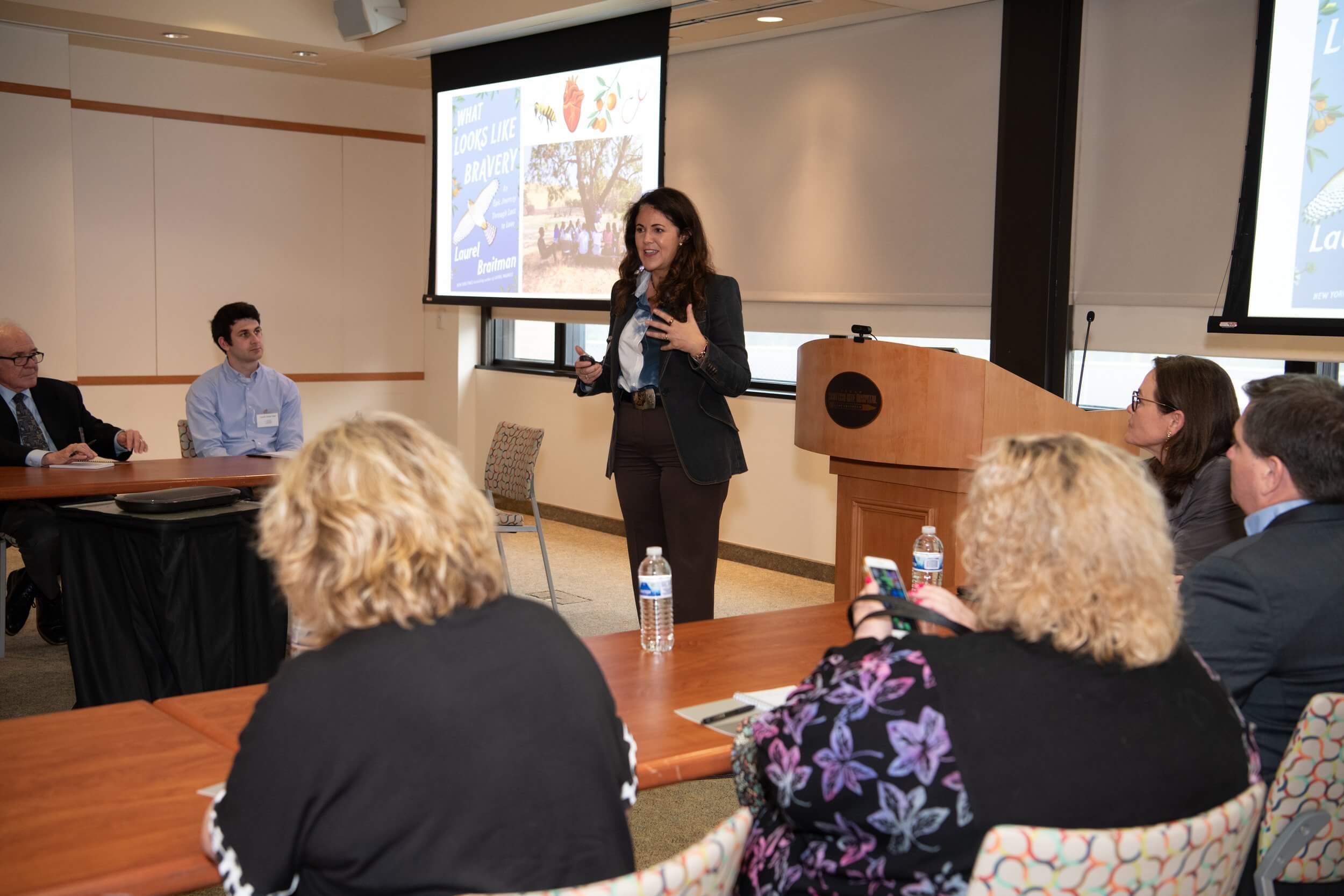 woman speaker talking at event