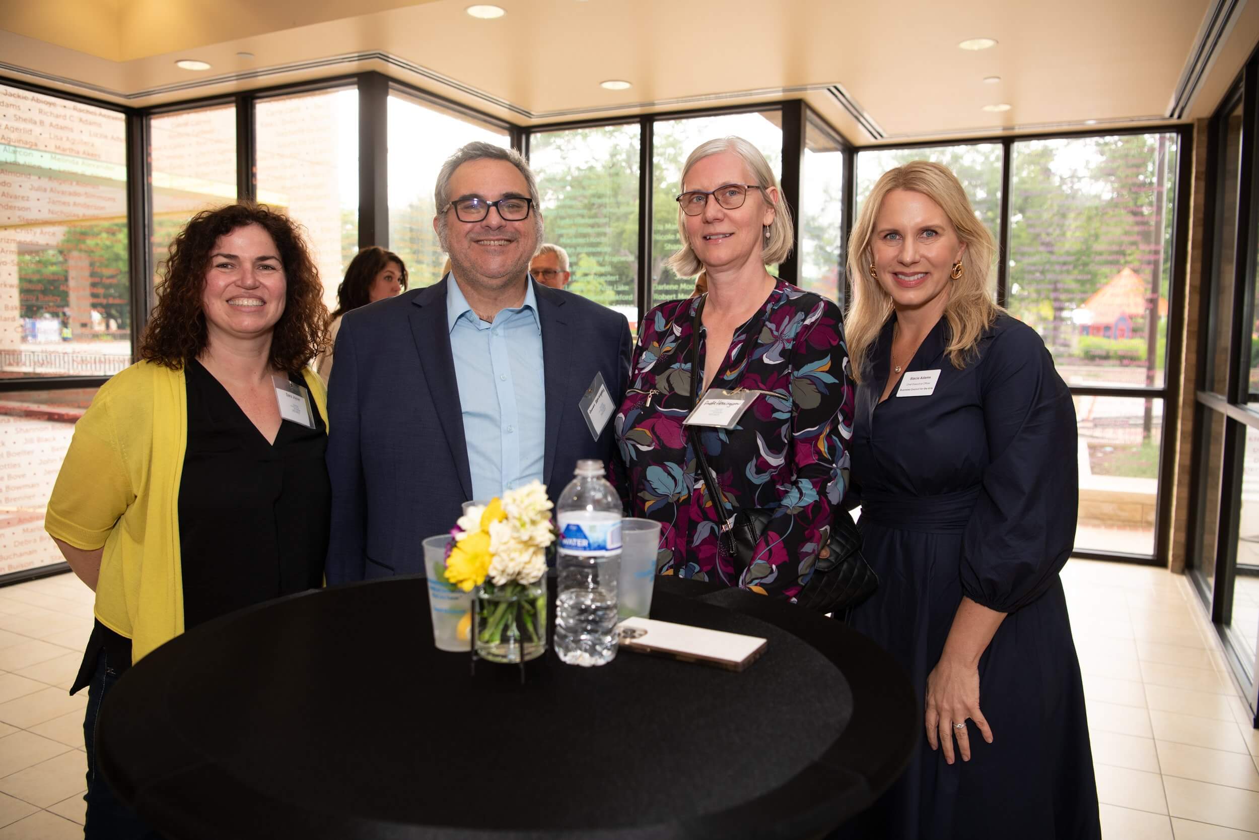 group of people smiling at event