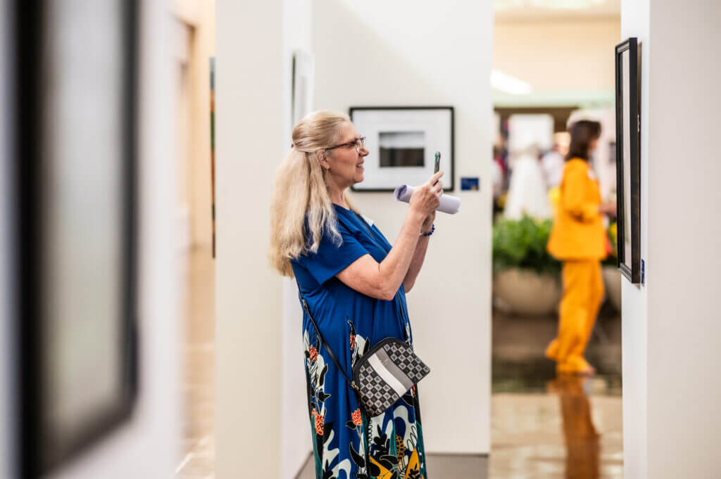 woman holding microphone