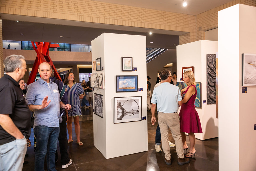 Guests at the 2026 On My Own Time opening reception at NorthPark Center